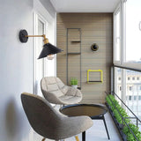 Wall lamp mounted on interior brick wall
