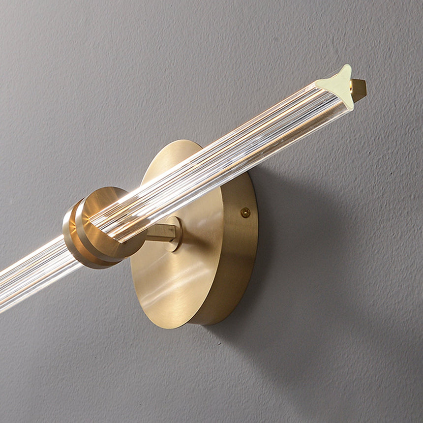 Close view of the joint where the glass rod passes through the round plate