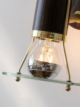 Close view of the filament lamp sitting inside the flat clear ring
