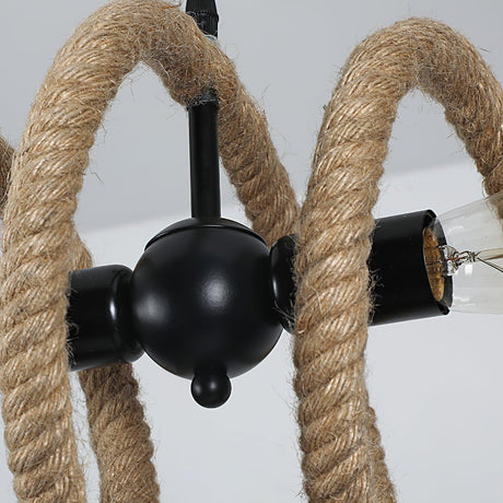 The black iron joint where the two lamp holders meet the rope core