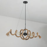 The coil hanging in a plain pale room, cables and canopy in view