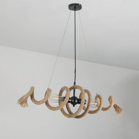 The coil hanging in a plain pale room, cables and canopy in view