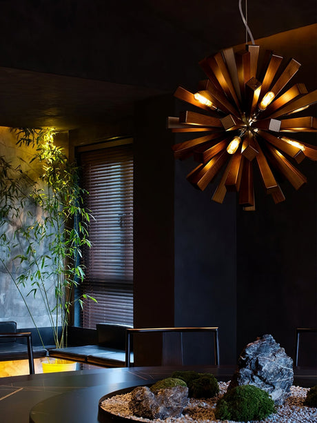 The burst lit in a dark room above a stone basin and planting