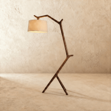 The same branch shaped frame in dark wood, the cream drum shade held out in front