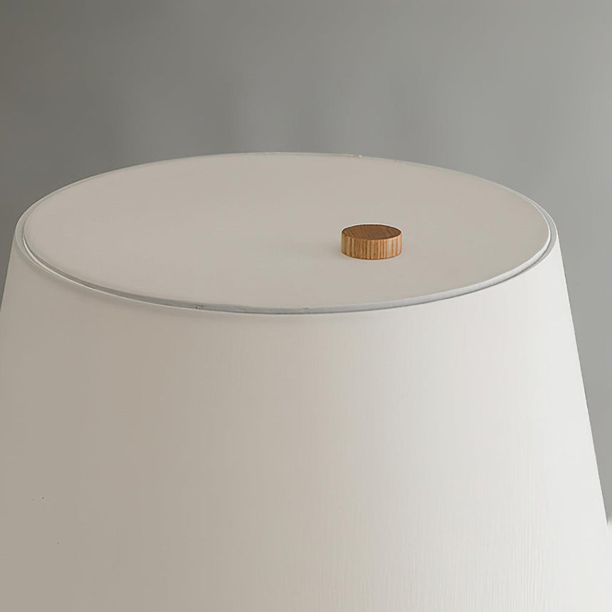 Close view of the turned hourglass waist and the grain running through it