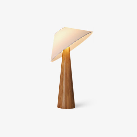 Tilted shade table lamp in natural wood seen from a slight angle