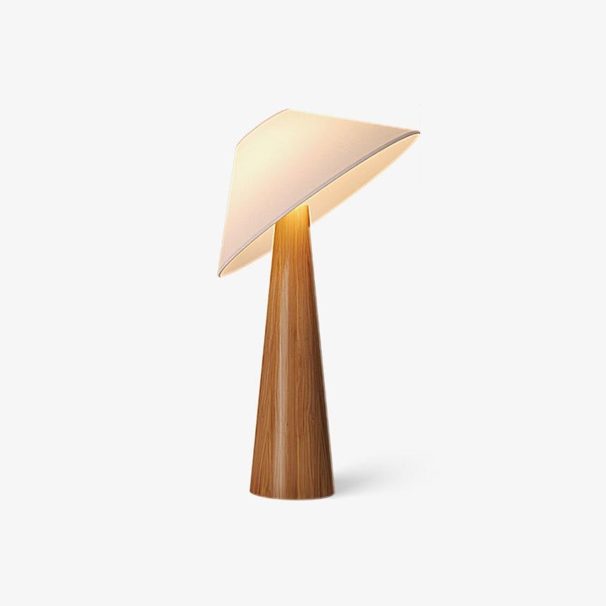 Table lamp with a tilted folded shade on a tapered solid wood cone