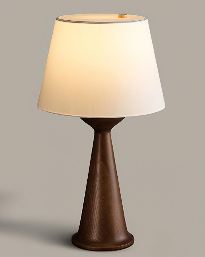 Japandi table lamp with the walnut hourglass base seen from the front