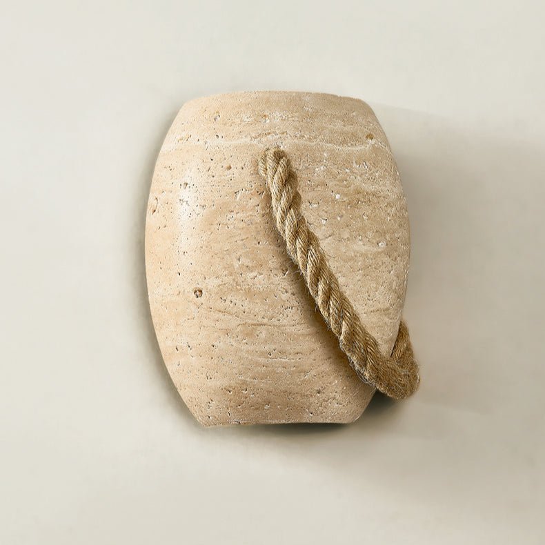 Front view of the urn with the rope crossing from top to bottom right