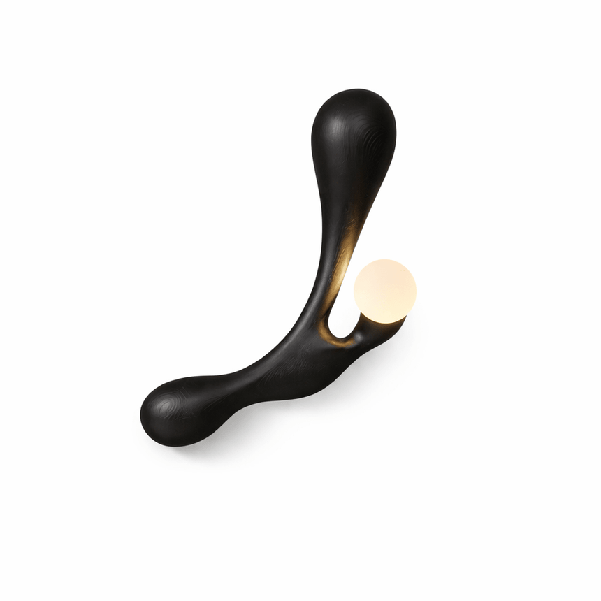 The black version with the opal globe bright against the dark arm