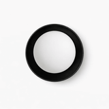 The black ring seen from the front, the white ball held inside the frame
