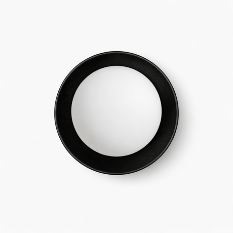 The black ring seen from the front, the white ball held inside the frame