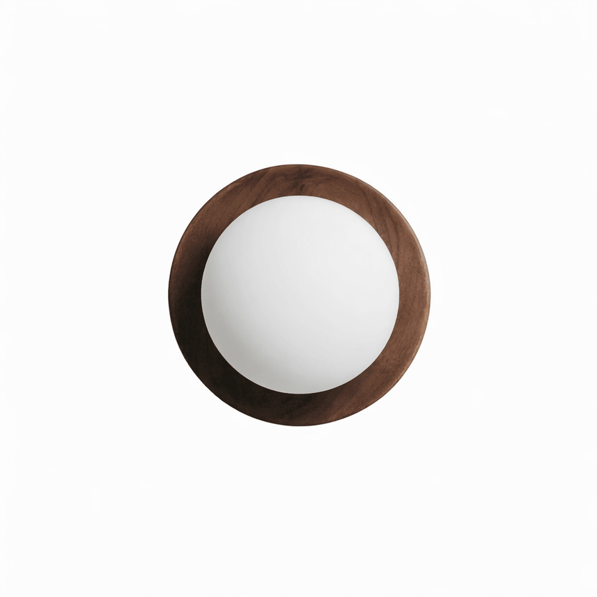 The walnut ring seen from the front, the frosted ball sitting proud of it