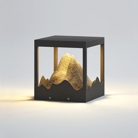 The sculpted peak seen close, the grain of the resin catching the light