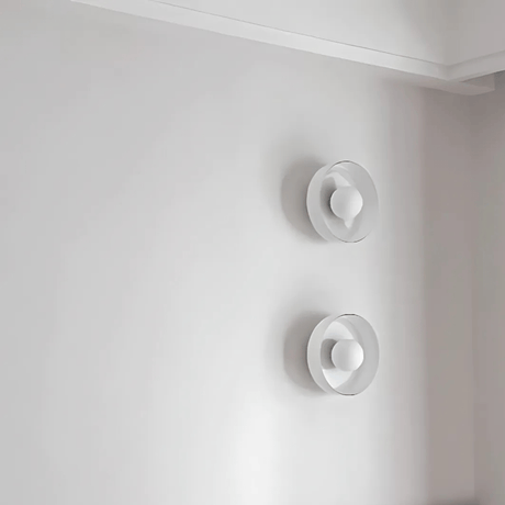 Wall lamp installed in bedroom setting