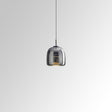 Tinted glass pendant light for compact spaces