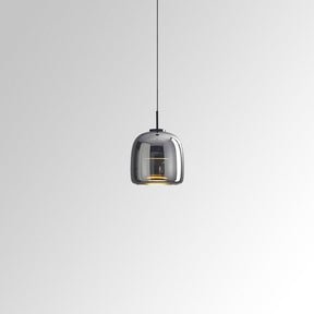 Tinted glass pendant light for compact spaces