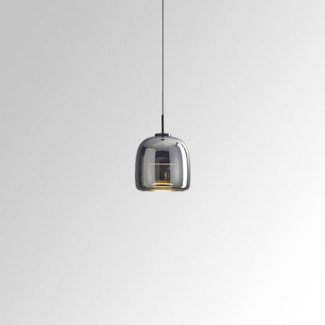Tinted glass pendant light for compact spaces