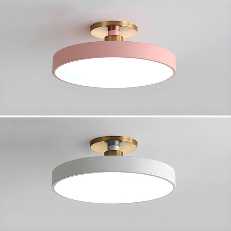 Pink and white drum ceiling lights shown on a plain backdrop
