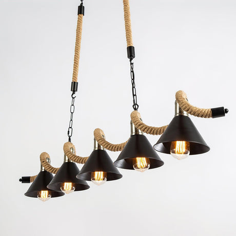 Four black cones and the rope wave above them seen at an angle