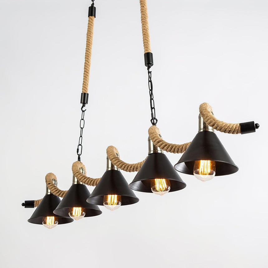 Four black cones and the rope wave above them seen at an angle