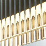 Close view of the ribbed acrylic face glowing along the metal bar