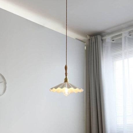 Pendant light with twisted fabric cable detail