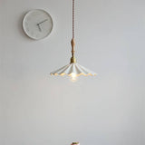 Ceramic pendant light above kitchen island