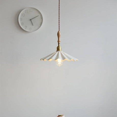 Ceramic pendant light above kitchen island