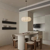 Ribbed silk lantern hung above a kitchen counter