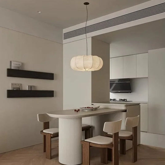Ribbed silk lantern hung above a kitchen counter