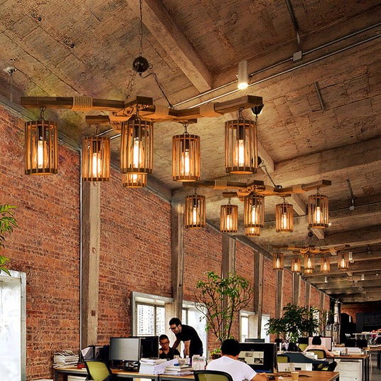 A row of the fittings lit down a brick walled room above long tables
