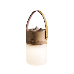 Lantern table lamp in natural ash with the leather strap, plain background