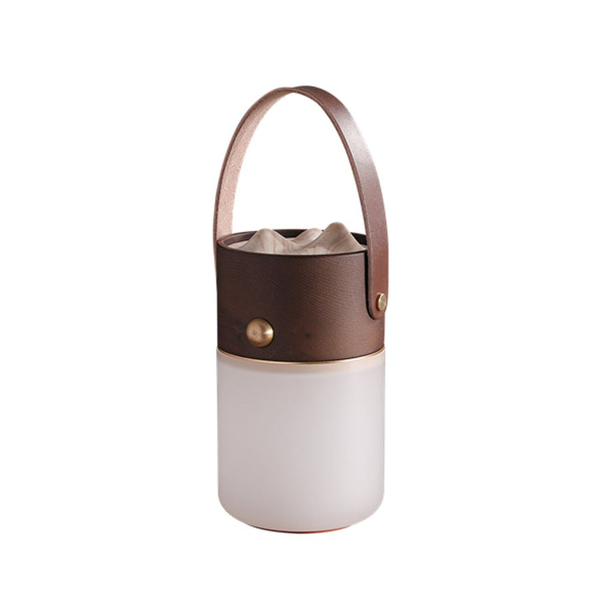Lantern table lamp in walnut with the leather strap, plain background