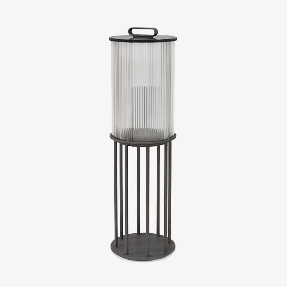 Fluted glass lantern with black bands and a tall four leg floor stand