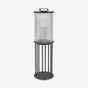 Fluted glass lantern with black bands and a tall four leg floor stand