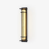 Tall wall lantern with a pale veined panel in a black cross bar frame