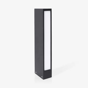 Slim dark bollard with a tall lit slot running down the front face