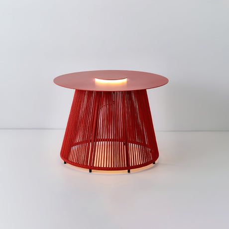 The red woven cord base and the round top of the table seen level