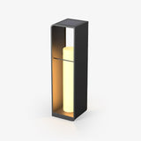 Upright garden light in dark gray with a recessed warm lit panel