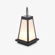 Tapered white lantern with a black frame and a tall arched handle