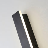 The strip seen at an angle against a pale surface, the acrylic edge lit warm