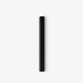 Slim black linear LED outdoor wall light, solar powered, the light edge along one side