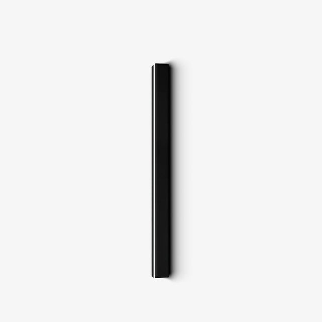 Slim black linear LED outdoor wall light, solar powered, the light edge along one side