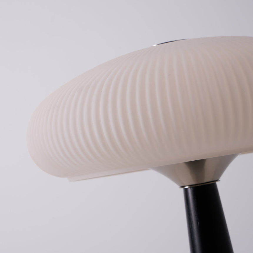 Close view of the opal glass shade seen from below the flutes