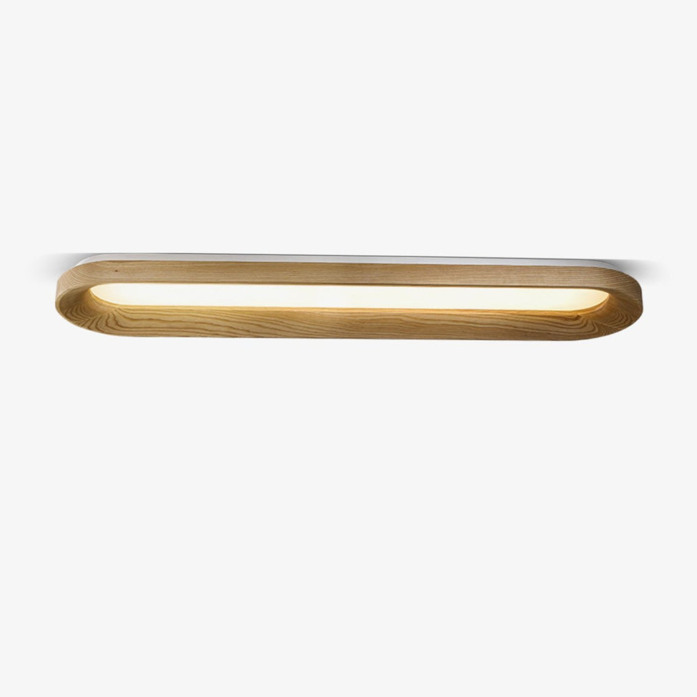 Linear flush mount ceiling light with a wood frame and acrylic diffuser, plain background
