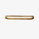 Wood frame linear ceiling light lit, seen at an angle against a plain background