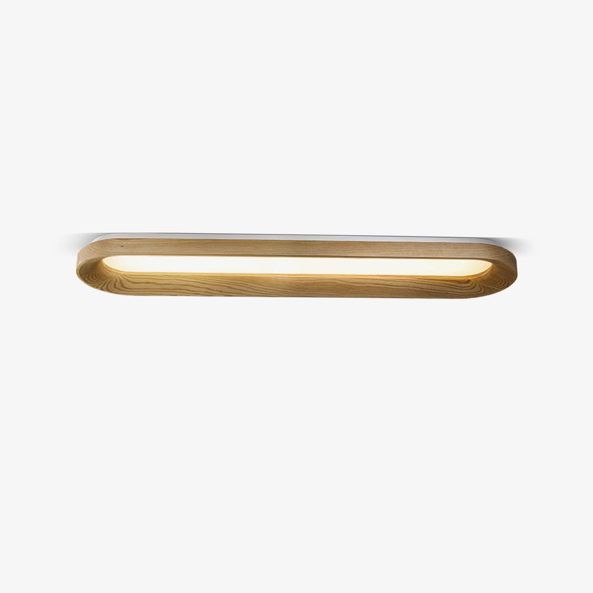 Wood frame linear ceiling light lit, seen at an angle against a plain background