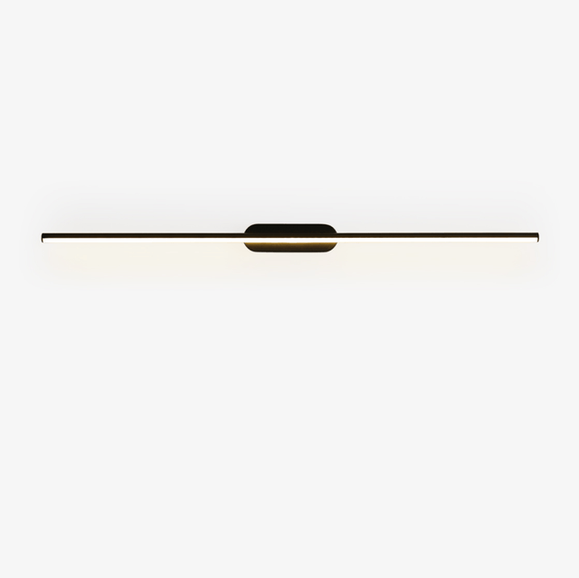 A very thin black rod crossing a small central hub, seen against a pale ground