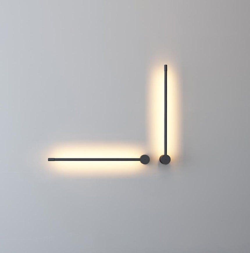 The two arm version lit in a corner, one arm horizontal and one vertical